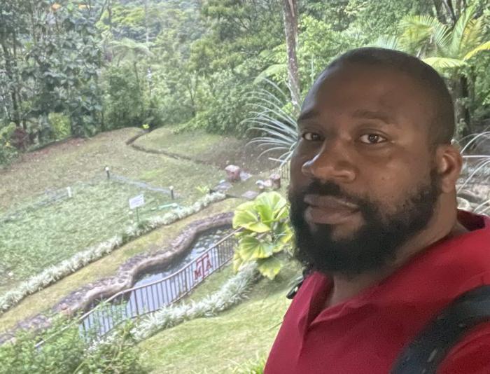 Duane Bedgood in a tropical forest field.